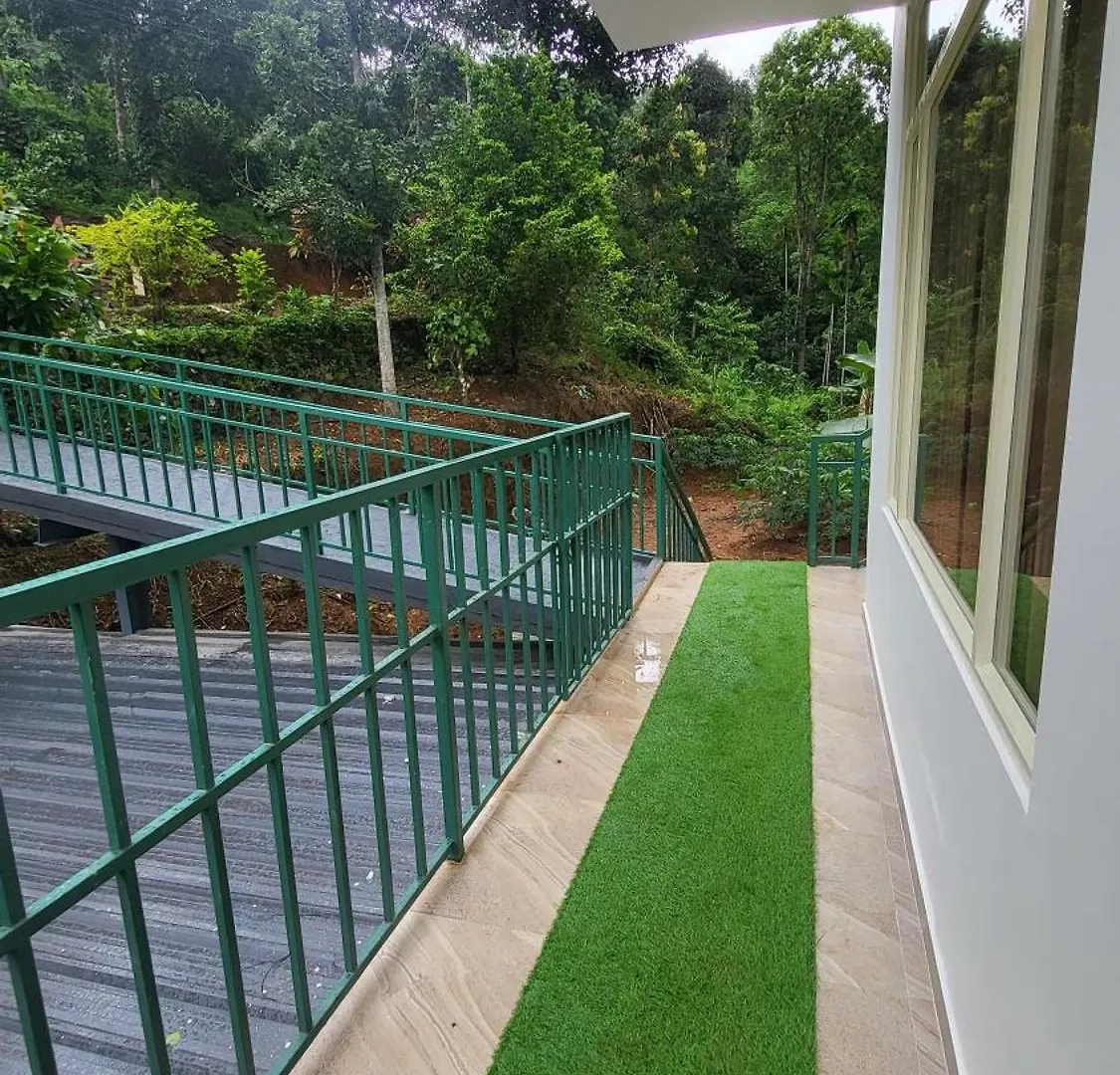 Δωμάτια σε οικογενειακή κατοικία Green Cradle Munnar Ινδία